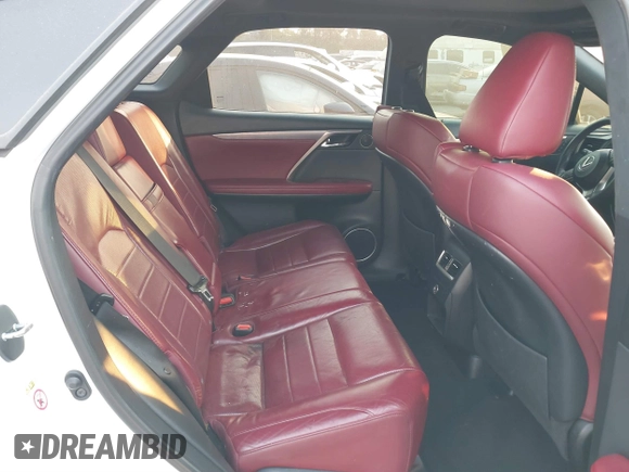 2019 Lexus RX with VIN 2T2BGMCAXKC036573, listed as a IAAI auction lot 41299079 with 104,568 mi miles. Bid and sale history available at carsss.com. Image 8.
