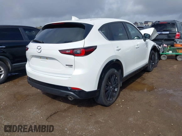2022 Mazda CX-5 • with VIN JM3KFBAY5N0524251, listed as a IAAI auction lot 41591692 with 28,493 mi miles and . Bid and sale history available at carsss.com. Image 4.