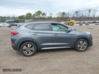 2017 Hyundai Tucson Value with VIN KM8J33A21HU359113, listed as a IAAI auction lot 41897638 with 80,010 mi miles. Bid and sale history available at carsss.com. Image 13.