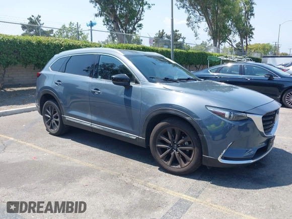 2022 Mazda CX-9 Grand Touring with VIN JM3TCBDY1N0611766, listed as a IAAI auction lot 42452059 with 60,755 mi miles and . Bid and sale history available at DreamBid. Image 1.