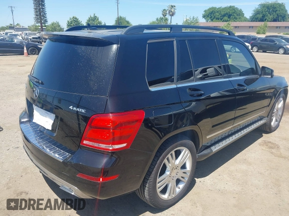 2013 Mercedes-Benz GLK with VIN WDCGG8JBXDG051067, listed as a IAAI auction lot 42107151 with 123,576 mi miles. Bid and sale history available at carsss.com. Image 4.