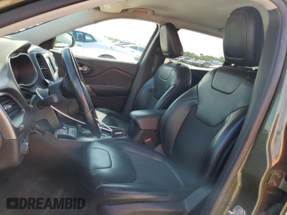 2019 Jeep Cherokee Latitude Plus with VIN 1C4PJLLXXKD262481, listed as a Copart auction lot 48874435 with 180,593 mi miles and Salvage Title. Bid and sale history available at carsss.com. Image 7.