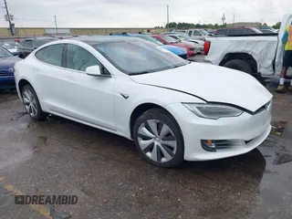 2021 Tesla Model S Long Range Plus with VIN 5YJSA1E21MF425482, listed as a IAAI auction lot 41886030 with Not provided miles and . Bid and sale history available at DreamBid. Image 1.