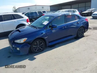 2015 Subaru WRX with VIN JF1VA1A64F9812603, listed as a IAAI auction lot 42012048 with 131,899 mi miles. Bid and sale history available at carsss.com. Image 2.
