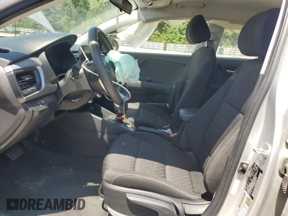2021 Kia Rio S with VIN 3KPA24AD5ME382580, listed as a Copart auction lot 56931054 with 63,445 mi miles and Salvage Title. Bid and sale history available at DreamBid. Image 7.