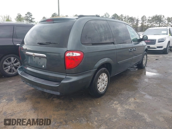2006 Chrysler Town & Country LX with VIN 2A4GP44R96R615942, listed as a IAAI auction lot 42039452 with 158,009 mi miles and . Bid and sale history available at DreamBid. Image 4.