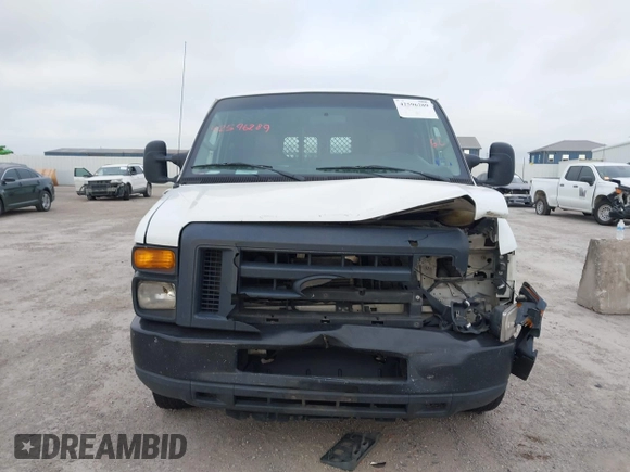 2013 Ford Econoline Cargo Commercial with VIN 1FTNE2EW9DDB02704, listed as a IAAI auction lot 42596289 with 243,629 mi miles and . Bid and sale history available at DreamBid. Image 11.