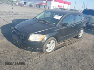 2008 Dodge Caliber SE with VIN 1B3HB28B58D776158, listed as a IAAI auction lot 41872879 with 197,843 mi miles and . Bid and sale history available at DreamBid. Image 2.