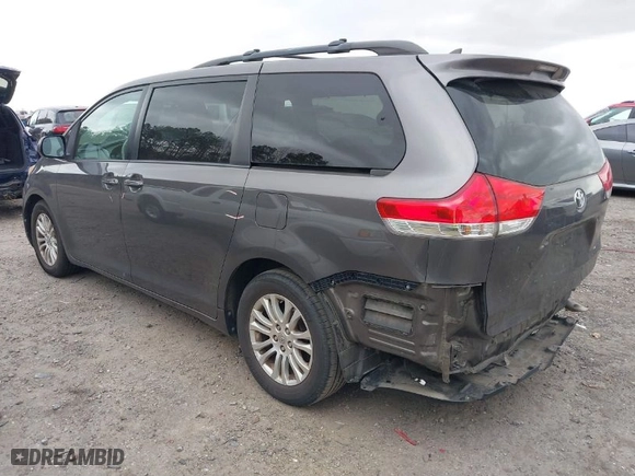 2012 Toyota Sienna XLE AAS with VIN 5TDYK3DC2CS276118, listed as a IAAI auction lot 41834422 with 143,043 mi miles. Bid and sale history available at carsss.com. Image 3.