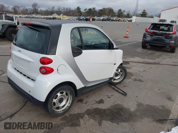 2013 Smart fortwo Pure with VIN WMEEJ3BA2DK702004, listed as a IAAI auction lot 41829808 with 53,545 mi miles and . Bid and sale history available at DreamBid. Image 4.