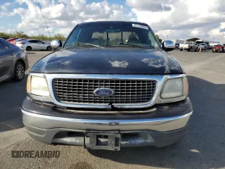 2000 Ford F-150 with VIN 1FTRX07W3YKA56561, listed as a Copart auction lot 81149654 with 185,967 mi miles and Salvage title. Bid and sale history available at DreamBid. Image 5.