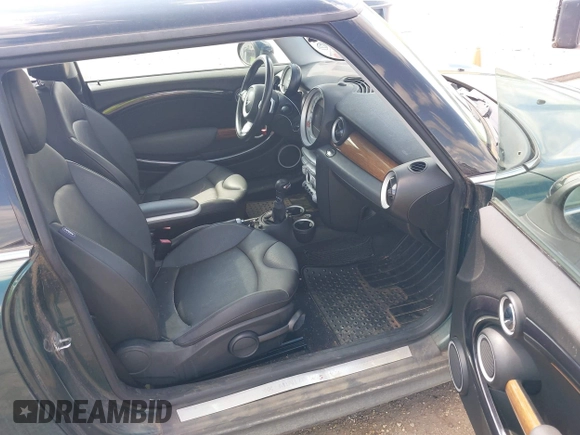 2009 MINI Hardtop S with VIN WMWMF73599TW83678, listed as a IAAI auction lot 42750705 with 95,278 mi miles and . Bid and sale history available at DreamBid. Image 5.