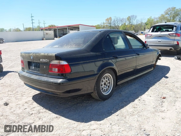2001 BMW 5 Series 530iA with VIN WBADT63421CF00607, listed as a IAAI auction lot 41780749 with 182,746 mi miles. Bid and sale history available at carsss.com. Image 4.