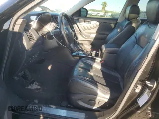 2014 Infiniti QX70 z VIN JN8CS1MU0EM450679, wystawiony jako Copart lot #49014645 z przebiegiem 212 186 mil mil oraz Szkoda całkowita • Salvage title. Historia ofert i sprzedaży dostępna na DreamBid. Obrazek 7.