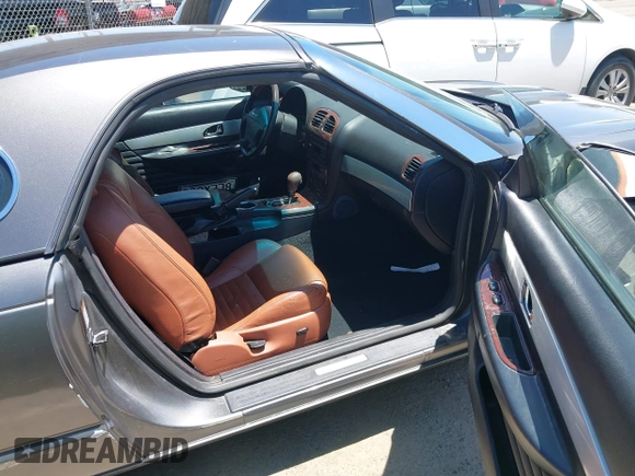 2003 Ford Thunderbird Deluxe z VIN 1FAHP60AX3Y109880, wystawiony jako IAAI lot #42336922 z przebiegiem 213 477 mil mil oraz . Historia ofert i sprzedaży dostępna na DreamBid. Obrazek 5.