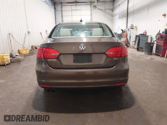 2014 Volkswagen Jetta TDI w/Premium with VIN 3VWLL7AJ1EM358214, listed as a IAAI auction lot 42148435 with 174,923 mi miles and . Bid and sale history available at DreamBid. Image 17.