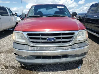 2001 Ford F-150 XL with VIN 1FTZX07261KA62955, listed as a Copart auction lot 56580915 with 159,451 mi miles and Salvage title. Bid and sale history available at DreamBid. Image 5.