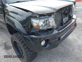 2007 Toyota Tacoma PreRunner z VIN 5TEJU62NX7Z338052, wystawiony jako IAAI lot #42204246 z przebiegiem 202 296 mil mil oraz . Historia ofert i sprzedaży dostępna na DreamBid. Obrazek 18.
