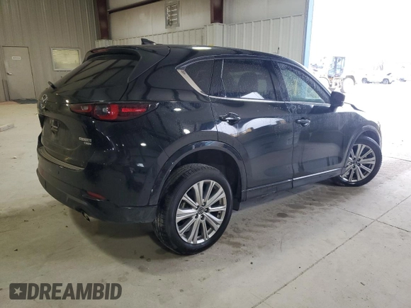 2023 Mazda CX-5 Signature with VIN JM3KFBXY6P0235017, listed as a Copart auction lot 45979615 with 14,487 mi miles and Salvage Title. Bid and sale history available at carsss.com. Image 3.