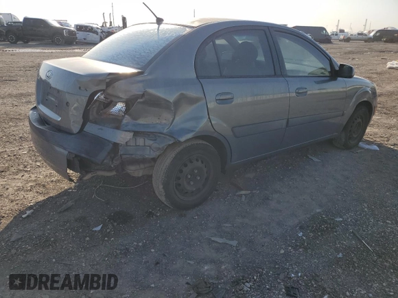 2007 Kia Rio LX with VIN KNADE123X76253489, listed as a Copart auction lot 52176475 with 148,154 mi miles and Salvage Title. Bid and sale history available at carsss.com. Image 3.