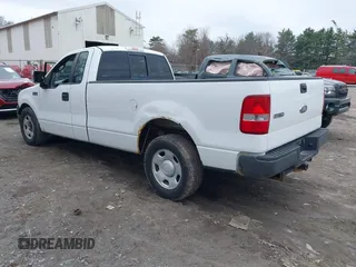 2007 Ford F-150 XL with VIN 1FTRF12257NA47662, listed as a IAAI auction lot 42003991 with 154,502 mi miles. Bid and sale history available at carsss.com. Image 3.