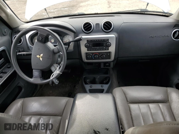 2007 Mitsubishi Raider LS z VIN 1Z7HT28K67S217597, wystawiony jako Copart lot #79767304 z przebiegiem 110 743 mil mil oraz Szkoda całkowita • Salvage title. Historia ofert i sprzedaży dostępna na DreamBid. Obrazek 8.