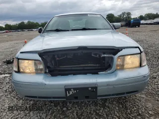 2011 Ford Crown Victoria LX z VIN 2FABP7EV3BX170123, wystawiony jako Copart lot #58020205 z przebiegiem 139 303 mil mil oraz Szkoda całkowita • Salvage title. Historia ofert i sprzedaży dostępna na DreamBid. Obrazek 5.