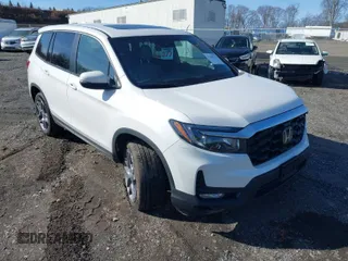 2023 Honda Passport EX-L with VIN 5FNYF8H58PB033596, listed as a IAAI auction lot 41485732 with 27,364 mi miles and . Bid and sale history available at carsss.com. Image 1.