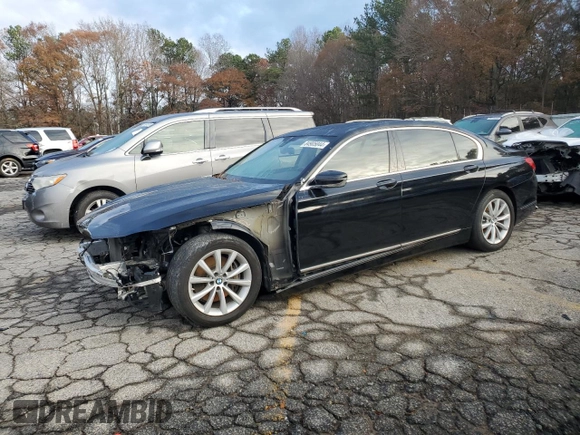 2018 BMW 7 Series 740i with VIN WBA7E2C58JG743269, listed as a Copart auction lot 84905044 with 74,951 mi miles and Salvage Title. Bid and sale history available at carsss.com. Image 1.
