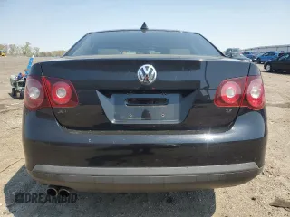 2010 Volkswagen Jetta S with VIN 3VWJX7AJ0AM010023, listed as a Copart auction lot 52379285 with 124,881 mi miles and Salvage title. Bid and sale history available at DreamBid. Image 6.