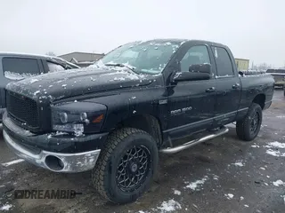 2006 Dodge 1500 SLT with VIN 1D7HU18256J142677, listed as a IAAI auction lot 41159900 with 236,662 mi miles. Bid and sale history available at carsss.com. Image 2.