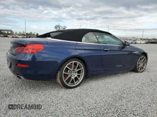 2012 BMW 6 Series 650i z VIN WBALZ3C50CDL70497, wystawiony jako Copart lot #82409164 z przebiegiem 17 982 mil mil oraz Szkoda całkowita • Salvage title. Historia ofert i sprzedaży dostępna na DreamBid. Obrazek 3.