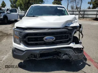 2023 Ford F-150 XL with VIN 1FTEX1CP5PKG20325, listed as a Copart auction lot 58496325 with 31,182 mi miles and Salvage title. Bid and sale history available at DreamBid. Image 5.