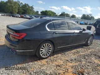 2017 BMW 7 Series 740i with VIN WBA7E2C57HG739482, listed as a Copart auction lot 53652145 with 102,418 mi miles and Salvage title. Bid and sale history available at DreamBid. Image 3.