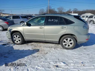2006 Lexus RX 330 z VIN 2T2HA31U96C095557, wystawiony jako IAAI lot #41631319 z przebiegiem 142 188 mil mil oraz . Historia ofert i sprzedaży dostępna na DreamBid. Obrazek 14.