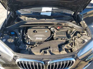2018 BMW X1 sDrive28i with VIN WBXHU7C37J5H43318, listed as a IAAI auction lot 41294730 with 73,600 mi miles. Bid and sale history available at carsss.com. Image 10.
