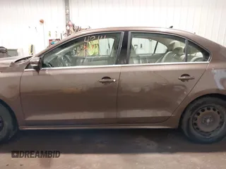 2014 Volkswagen Jetta TDI w/Premium with VIN 3VWLL7AJ1EM358214, listed as a IAAI auction lot 42148435 with 174,923 mi miles and . Bid and sale history available at DreamBid. Image 15.