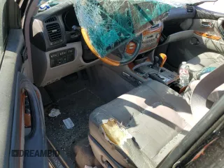 2004 Lexus LX 470 with VIN JTJHT00W043536558, listed as a Copart auction lot 48498305 with Not Provided miles and Salvage Title. Bid and sale history available at DreamBid. Image 8.