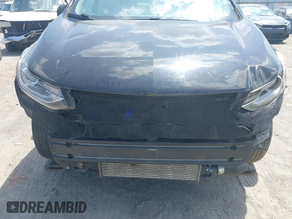 2020 Chevrolet Trax LT with VIN KL7CJLSB6LB014470, listed as a IAAI auction lot 42194730 with Not Provided miles and . Bid and sale history available at DreamBid. Image 6.