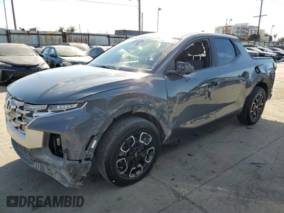 2022 Hyundai Santa Cruz SEL z VIN 5NTJBDAE2NH015174, wystawiony jako Copart lot #56071745 z przebiegiem 19 407 mil mil oraz Szkoda całkowita • Salvage title. Historia ofert i sprzedaży dostępna na DreamBid. Obrazek 1.