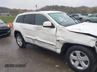 2012 Jeep Grand Cherokee Laredo with VIN 1C4RJFAG6CC297958, listed as a IAAI auction lot 40859811 with 213,499 mi miles. Bid and sale history available at carsss.com. Image 17.