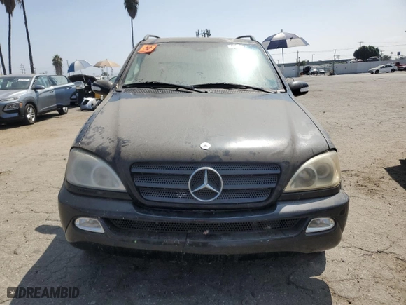 2002 Mercedes-Benz M-Class with VIN 4JGAB54E32A338132, listed as a Copart auction lot 67854164 with 0 mi miles and Salvage Title. Bid and sale history available at carsss.com. Image 5.