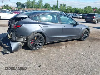 2023 Tesla Model 3 Performance z VIN 5YJ3E1ECXPF482320, wystawiony jako IAAI lot #42289417 z przebiegiem 31 296 mil mil oraz . Historia ofert i sprzedaży dostępna na DreamBid. Obrazek 4.