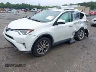 2016 Toyota RAV4 Limited with VIN 2T3YFREV6GW293418, listed as a IAAI auction lot 42367428 with 210,000 mi miles and . Bid and sale history available at DreamBid. Image 2.