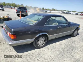 1987 Mercedes-Benz 560 with VIN WDBCA45D3HA358923, listed as a Copart auction lot 52143895 with 127,974 mi miles and Clean Title. Bid and sale history available at DreamBid. Image 3.