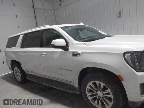 2021 GMC Yukon XL SLT with VIN 1GKS2GKD4MR414318, listed as a IAAI auction lot 41590618 with 49,913 mi miles. Bid and sale history available at carsss.com. Image 13.