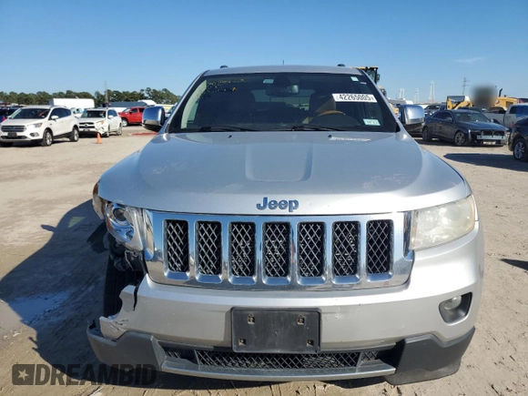 2013 Jeep Grand Cherokee Overland with VIN 1C4RJECG4DC644809, listed as a Copart auction lot 42265005 with 213,493 mi miles and Salvage Title. Bid and sale history available at carsss.com. Image 5.