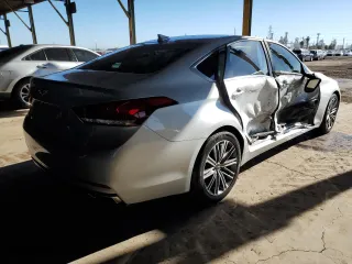 2018 Genesis G80 3.8L with VIN KMHGN4JE4JU215890, listed as a Copart auction lot 50455605 with 57,043 mi miles and Salvage Title. Bid and sale history available at carsss.com. Image 3.