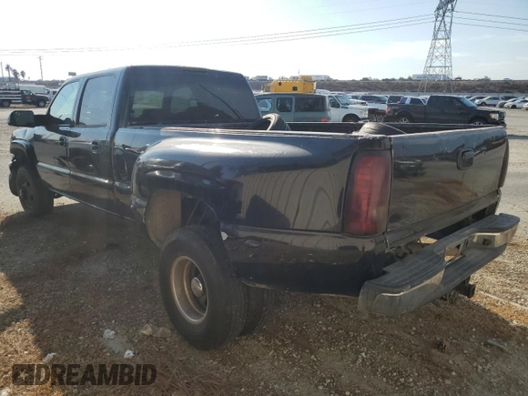2005 GMC Sierra 1500 with VIN 1GTJC33235F813444, listed as a Copart auction lot 74541684 with 520,838 mi miles and Salvage Title. Bid and sale history available at DreamBid. Image 2.