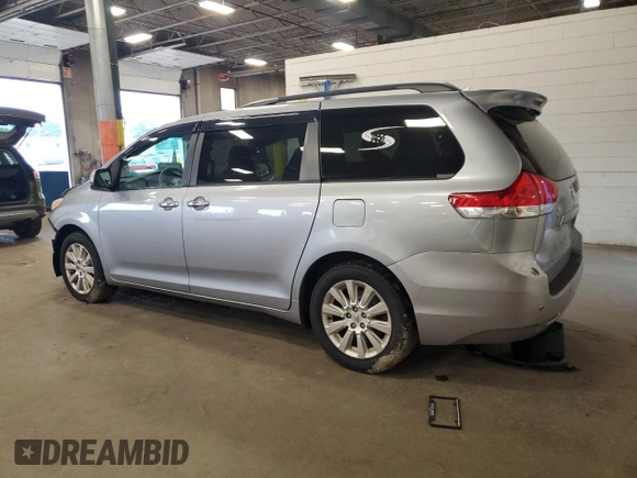 2012 Toyota Sienna XLE with VIN 5TDDK3DC2CS031088, listed as a Copart auction lot 60642845 with 186,586 mi miles and Salvage title. Bid and sale history available at DreamBid. Image 2.